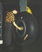 Inspecting Landing Gear at Willow Run